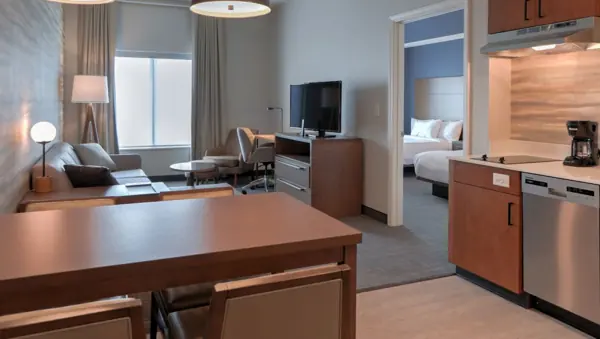 Residence Inn Pigeon Forge One Bedroom Suite (ONQQ) living into bedroom