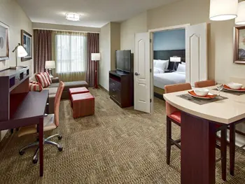 Living area of the Staybridge Anaheim 2 Queen 1 Bedroom Suite Sofa Bed