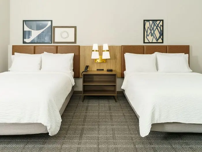 Bedroom with two queen beds.